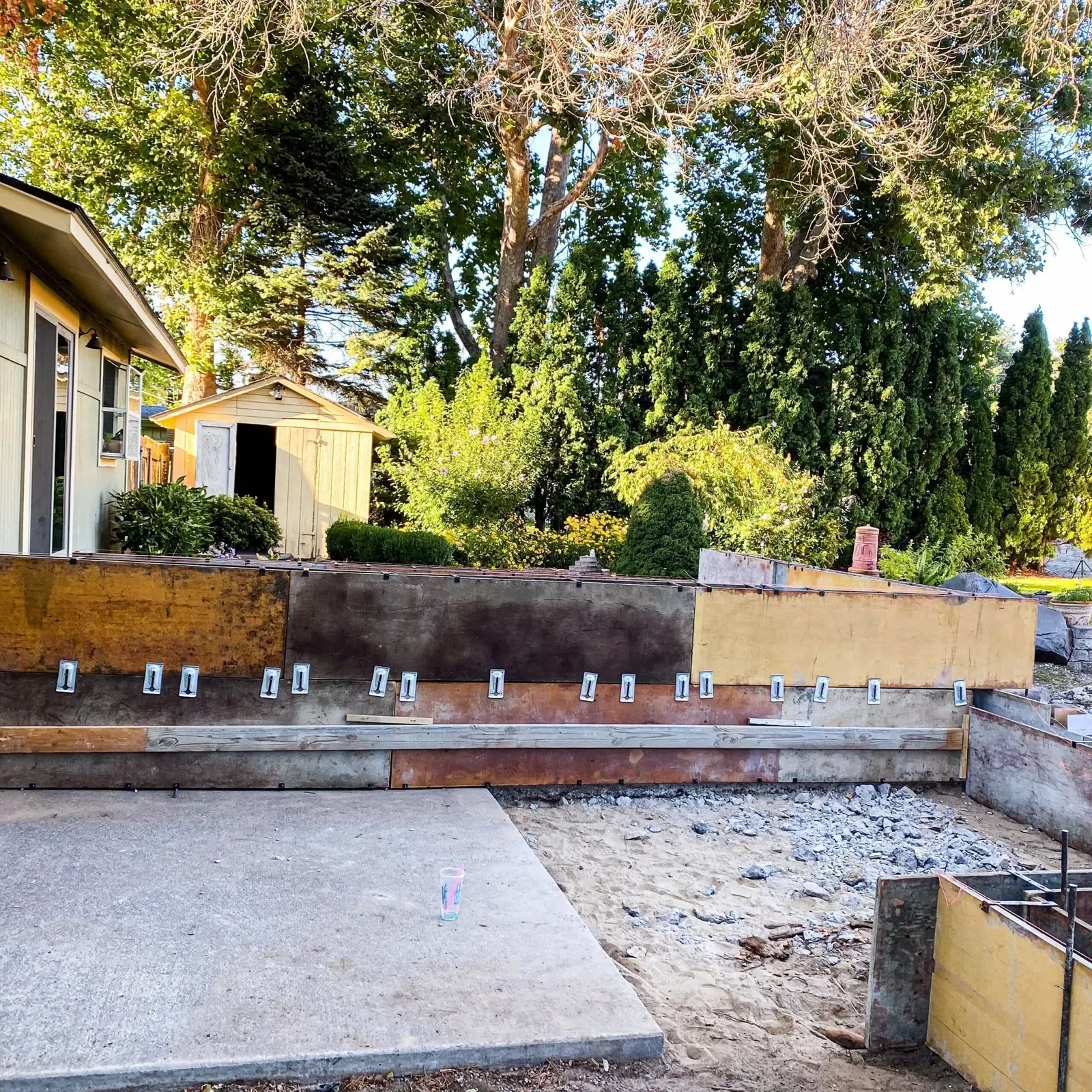 Foundation stem-wall forms with anchor bolts set in a backyard project